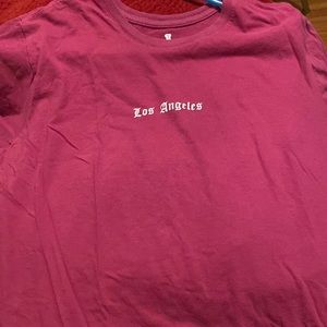 The relaxed tee , XL shirt . Purple kinda of color